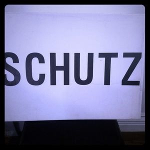 Schultz peep toe suede boots.